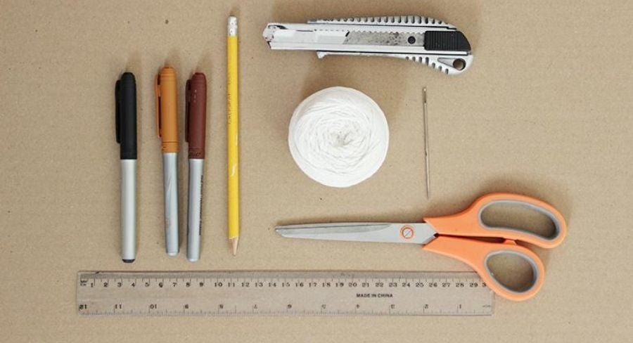 Materiales para hacer portafolio de juguete para niños con cartón