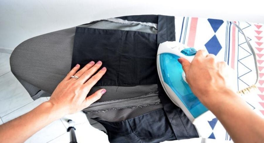 planchando pantalon al contrario superior
