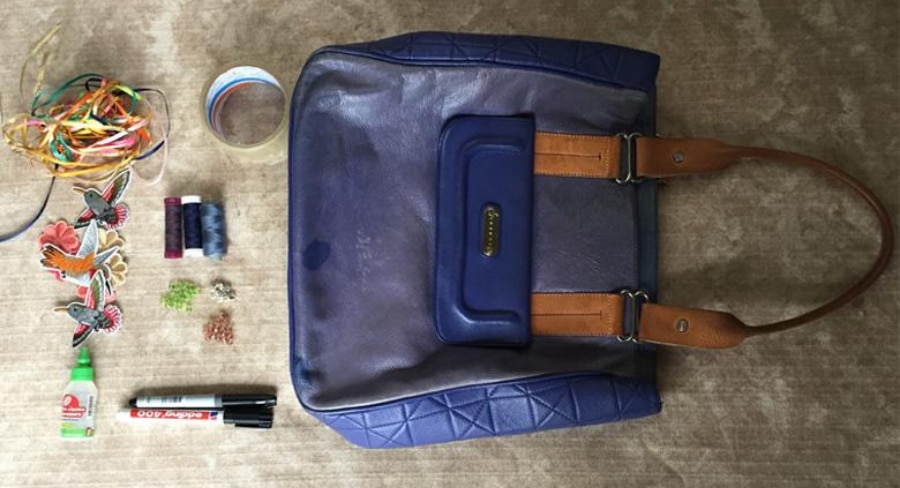 cartera-azul-con-decoraciones.jpg elementos para decorar cartera